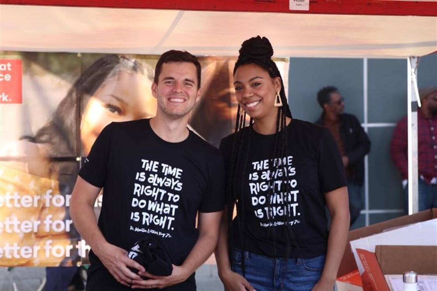 How to elevate your employer brand is depicted with employees in a photo. They're happy, they're thriving, and they are showcasing their brand.
